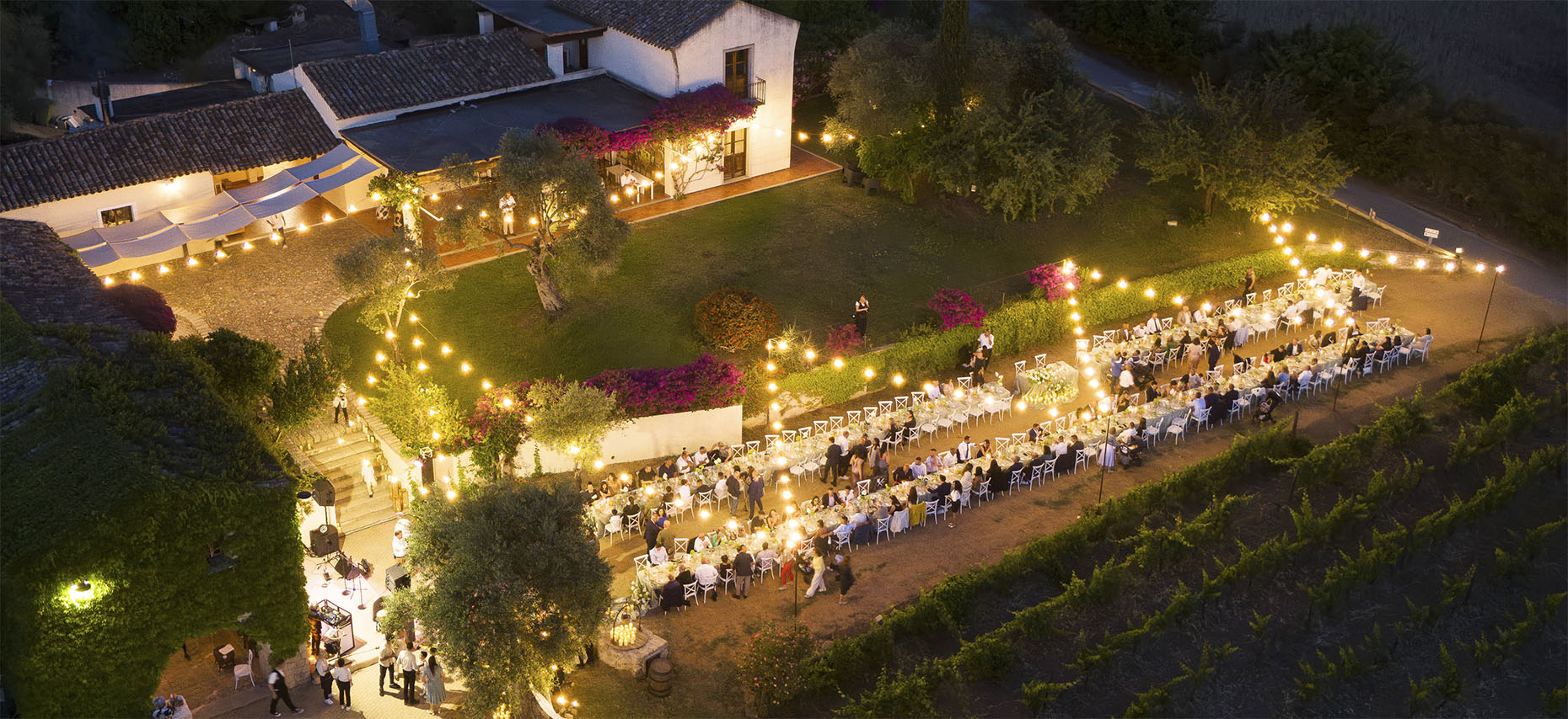 Wedding dinner under lights at Abba e Murta